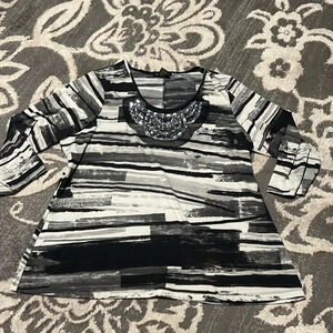 Susan Lawrence top. Beautiful beading. Super soft and stretchy.